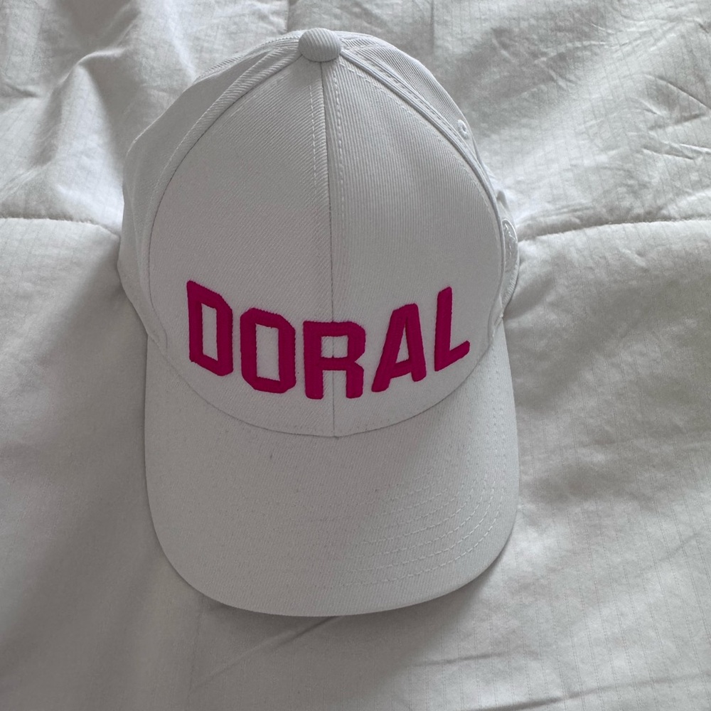 White Cap with Pink DORAL Logo